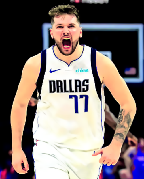 Luka Doncic 77 of the Dallas Mavericks reacts after a basket during the second quarter against